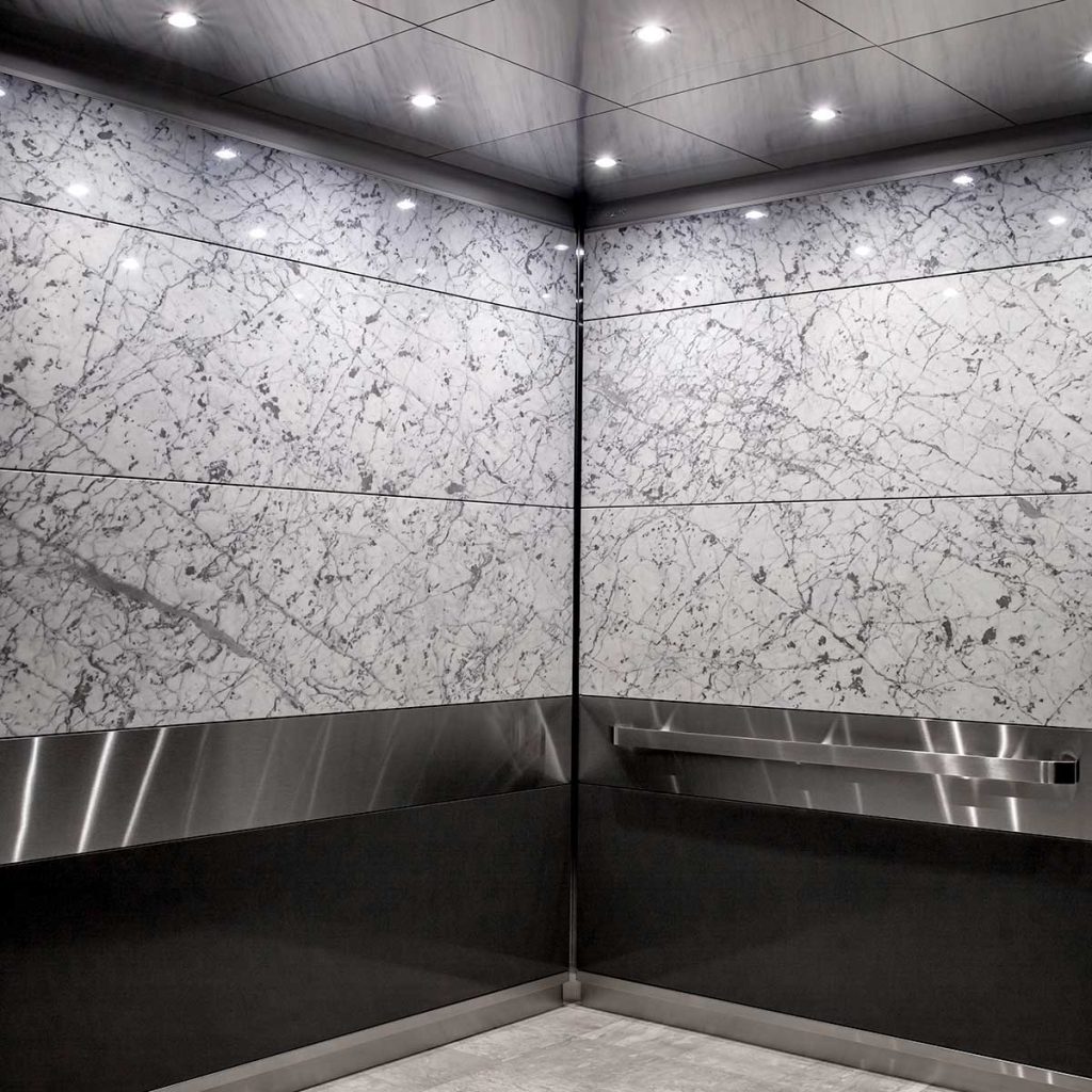 Wilsonart Compact Laminate elevator interiors are perfect for water-prone environments and offer premium finishes that mimic the natural look of wood or stone.
